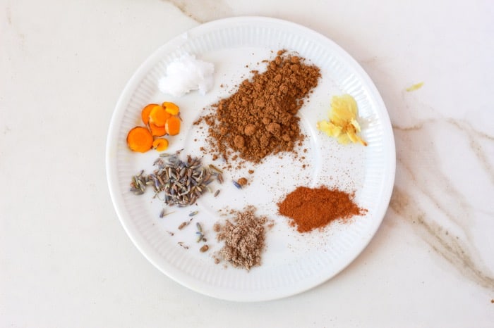spices and ingredients for Lavender moon milk on a plate