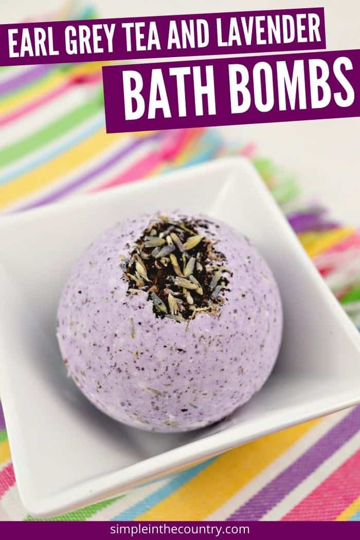 homemade earl grey tea and lavender bath bomb on a white plate on a multicolor placemat